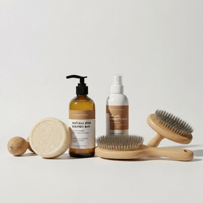 Assortment of natural dog grooming products on a clean background